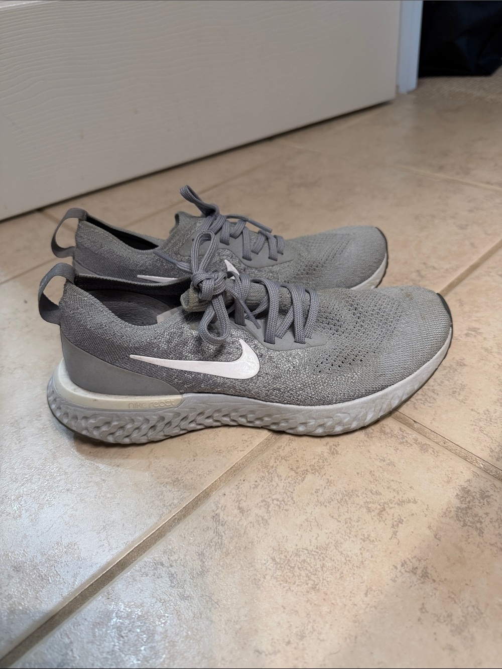 Nike Light Gray Knit Running Shoes with White Swoosh